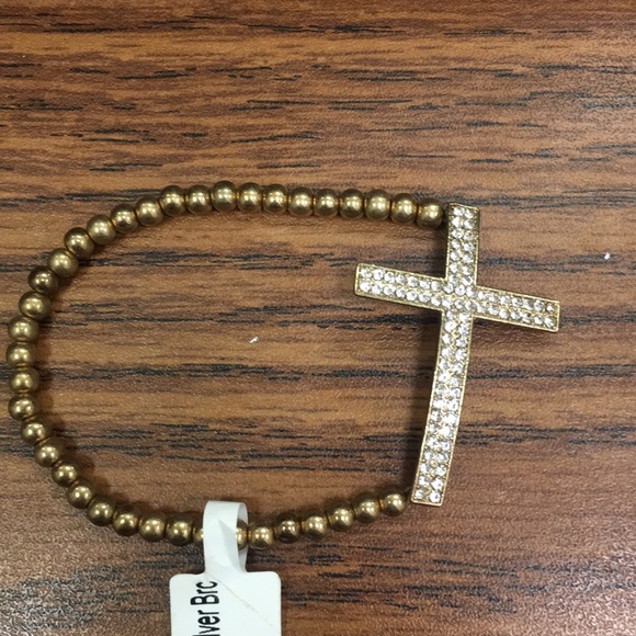 Jewelry - NWT gold cross bracelet